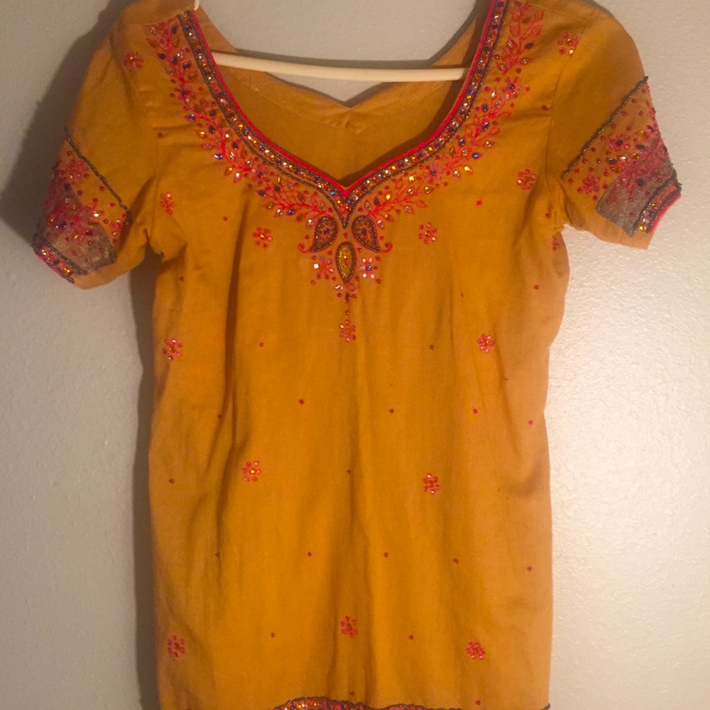 Beautiful hand bedazzled blouse.